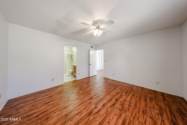 812 E Piute Ave, Phoenix, AZ 85024 - unfurnished room featuring wood finished floors, ceiling fan, and baseboards