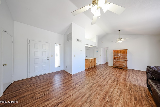 812 E Piute Ave, Phoenix, AZ 85024 - unfurnished living room featuring a ceiling fan, high vaulted ceiling, and wood finished floors