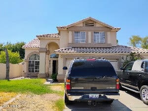 view of front of property with a garage