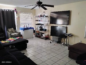 living room with ceiling fan