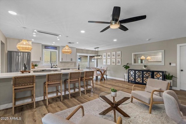 5332 N 81st Pl, Scottsdale, AZ 85250 - living room featuring wood finished floors, recessed lighting, and a ceiling fan