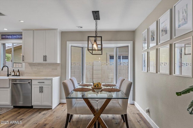 5332 N 81st Pl, Scottsdale, AZ 85250 - dining area featuring light wood-type flooring and recessed lighting