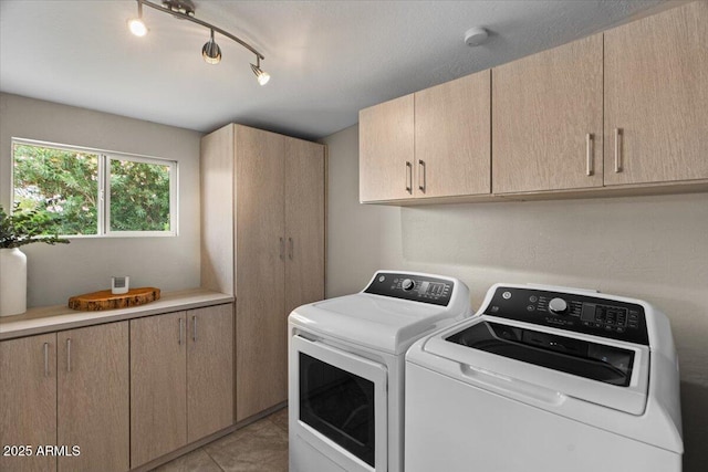 5332 N 81st Pl, Scottsdale, AZ 85250 - laundry room with washer and dryer, cabinet space, light tile patterned floors, and track lighting