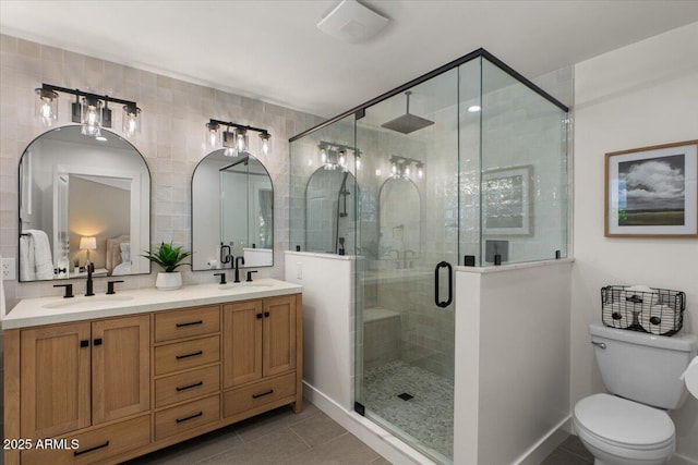 5332 N 81st Pl, Scottsdale, AZ 85250 - full bathroom featuring double vanity, a stall shower, and tile patterned flooring