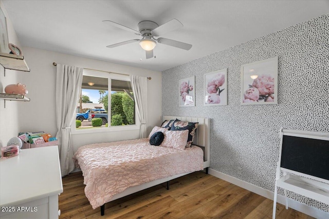5332 N 81st Pl, Scottsdale, AZ 85250 - bedroom featuring wood finished floors and a ceiling fan
