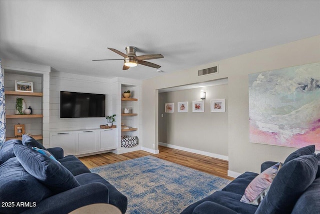 5332 N 81st Pl, Scottsdale, AZ 85250 - living room with a ceiling fan and light wood-style floors
