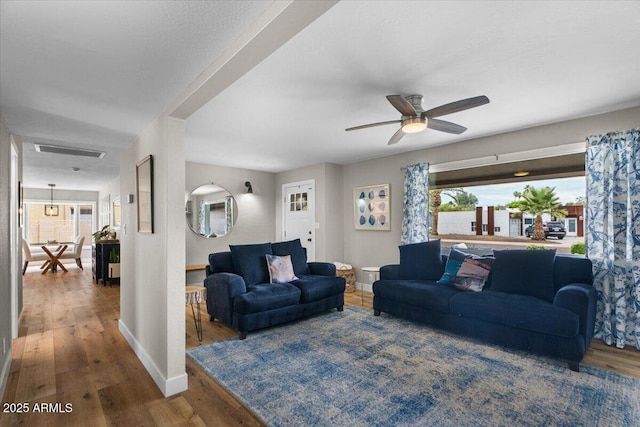 5332 N 81st Pl, Scottsdale, AZ 85250 - living area featuring wood finished floors and ceiling fan