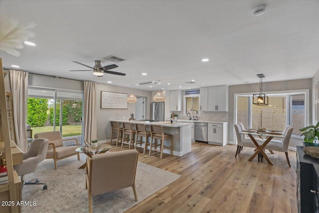 5332 N 81st Pl, Scottsdale, AZ 85250 - living area featuring light wood-style flooring, recessed lighting, and a ceiling fan