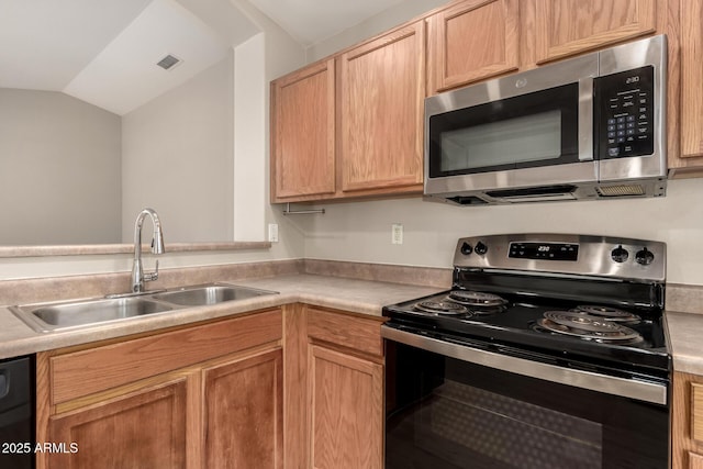 10317 E Kiva Cir, Mesa, AZ 85209 - kitchen with visible vents, a sink, light countertops, appliances with stainless steel finishes, and vaulted ceiling
