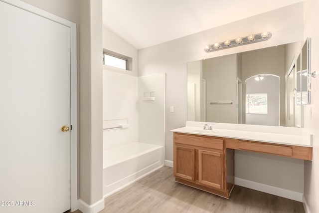 10317 E Kiva Cir, Mesa, AZ 85209 - bathroom with vanity, baseboards, and wood finished floors