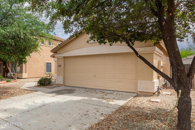 10317 E Kiva Cir, Mesa, AZ 85209 - view of front facade featuring an attached garage, driveway, and stucco siding