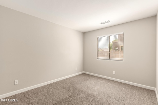 10317 E Kiva Cir, Mesa, AZ 85209 - empty room featuring visible vents, baseboards, and carpet