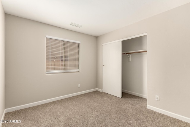 10317 E Kiva Cir, Mesa, AZ 85209 - unfurnished bedroom featuring a closet, visible vents, baseboards, and carpet