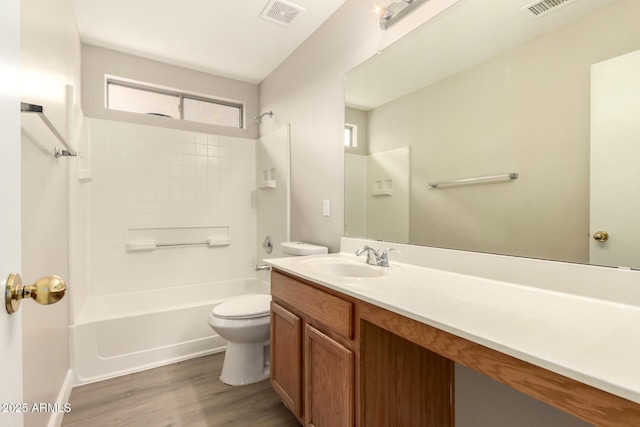 10317 E Kiva Cir, Mesa, AZ 85209 - full bathroom with visible vents, toilet,  shower combination, vanity, and wood finished floors
