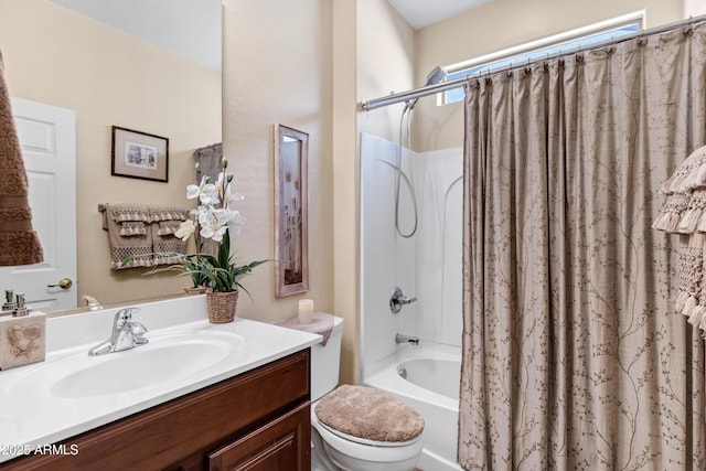 full bathroom featuring vanity, shower / bathtub combination with curtain, and toilet