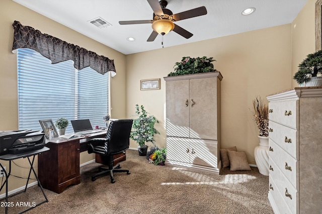 office space featuring ceiling fan and carpet