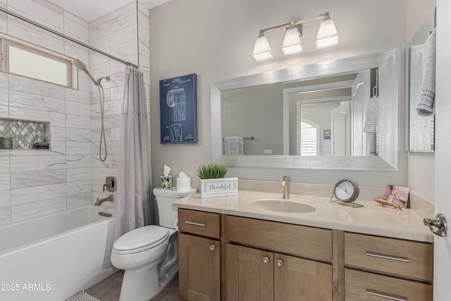 full bathroom featuring shower / bath combo, vanity, and toilet