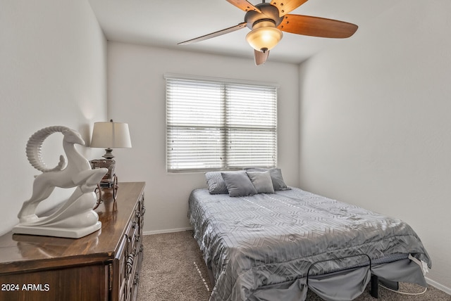 bedroom with ceiling fan and carpet