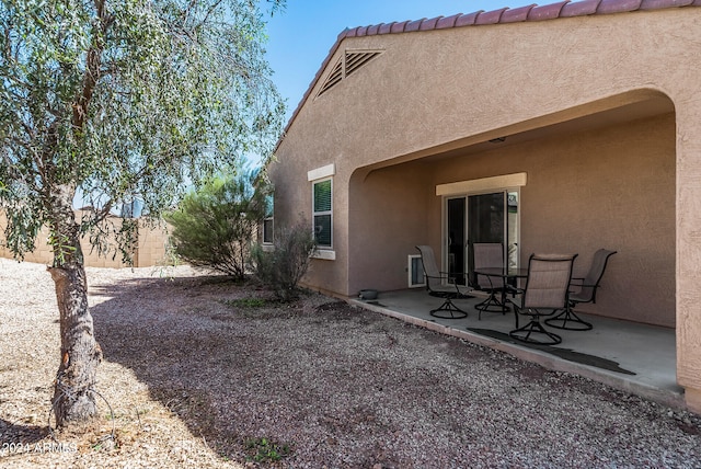 rear view of house with a patio area