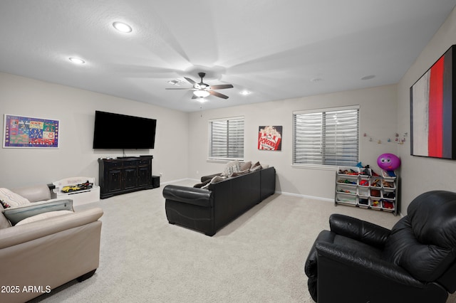 carpeted living room with recessed lighting, ceiling fan, and baseboards