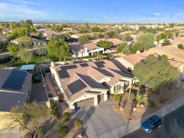 birds eye view of property with a residential view