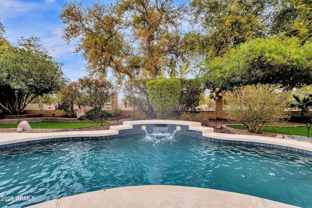 view of swimming pool featuring pool water feature