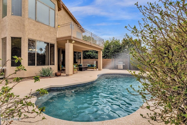 view of pool featuring an outdoor hangout area and a patio