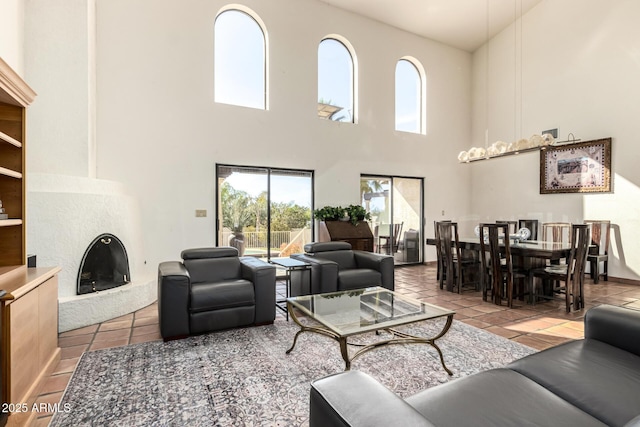 tiled living room with a high end fireplace