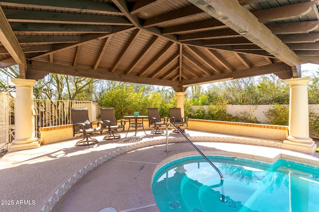 view of pool featuring fence, outdoor dining area, a patio, and a gazebo