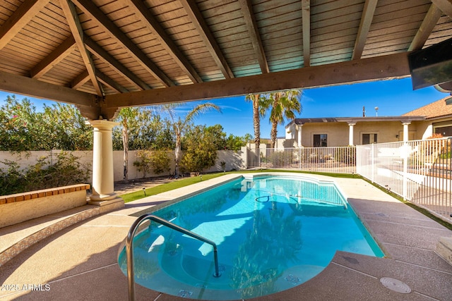 view of pool featuring a patio area, a fenced backyard, and a fenced in pool