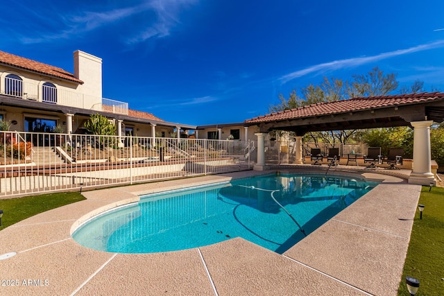 view of pool with a fenced in pool, a patio, a gazebo, and fence