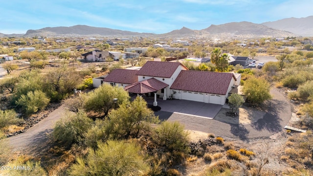 drone / aerial view featuring a mountain view