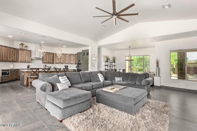 living room featuring high vaulted ceiling and ceiling fan