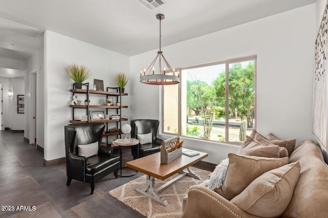 living room with a notable chandelier