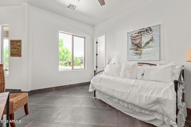 bedroom with ceiling fan and lofted ceiling