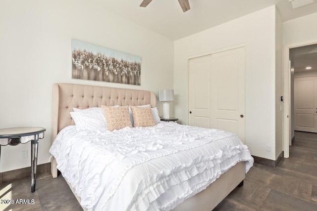 bedroom with ceiling fan and a closet