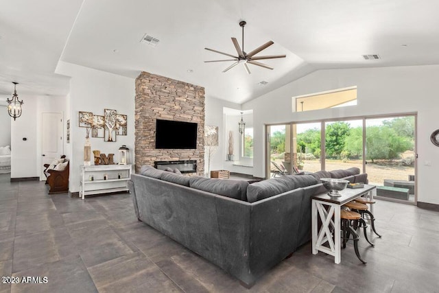 living room with ceiling fan, a fireplace, and high vaulted ceiling