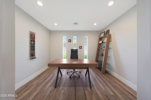 office area with recessed lighting, baseboards, and wood finished floors