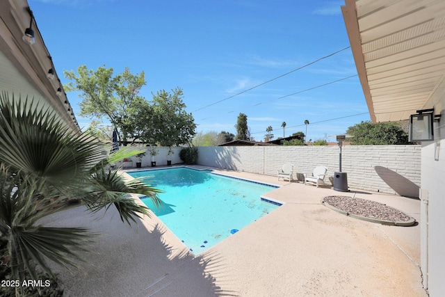 view of pool featuring a patio, a fenced backyard, and a fenced in pool