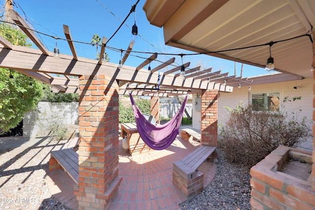 view of patio featuring a pergola