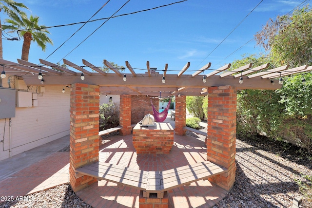 view of patio / terrace featuring a pergola