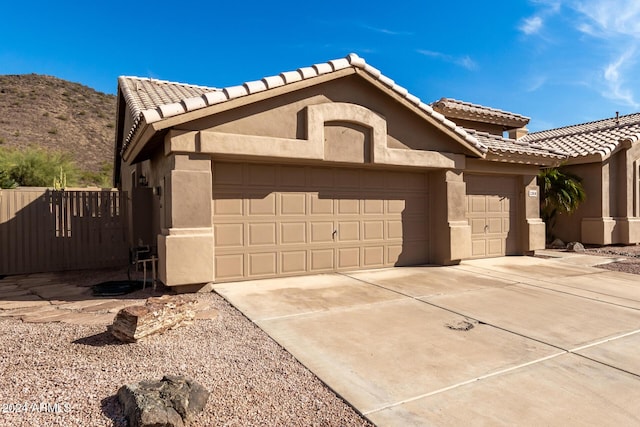 view of front of property with a mountain view