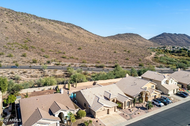 drone / aerial view featuring a mountain view