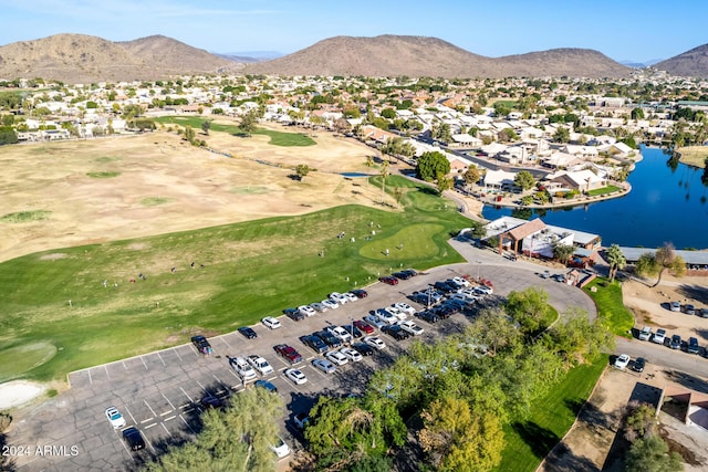 bird's eye view with a water and mountain view