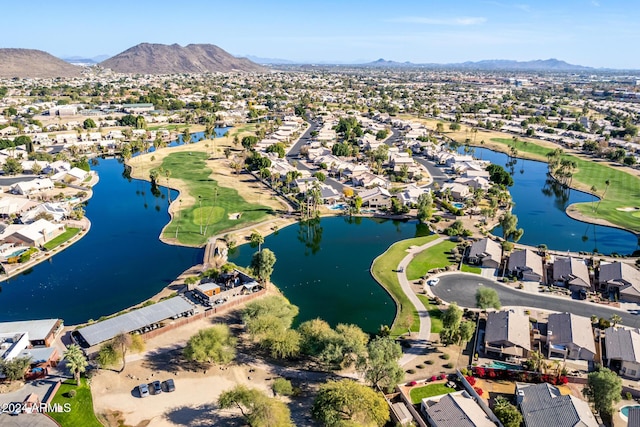 bird's eye view featuring a water and mountain view