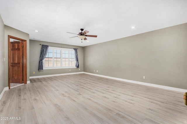 spare room with light wood-style flooring, baseboards, ceiling fan, and recessed lighting