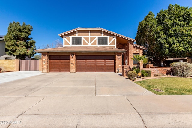 view of front of house with driveway, a garage, fence, and brick siding