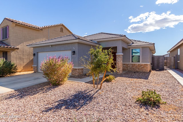 view of front of home with a garage