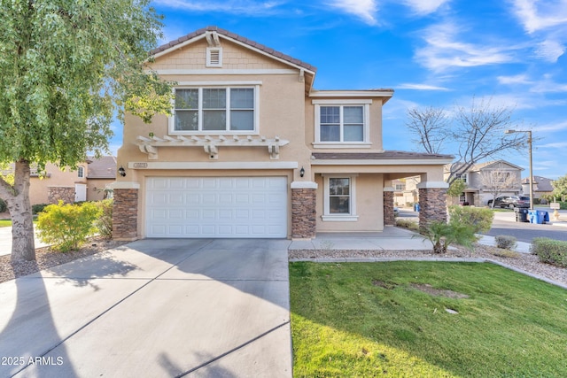 view of front of property featuring a garage and a front lawn