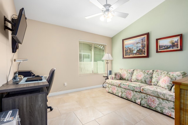 office area featuring ceiling fan, lofted ceiling, and light tile patterned floors